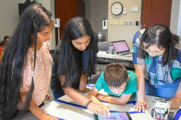 Harshita Ganga with her team participating in event